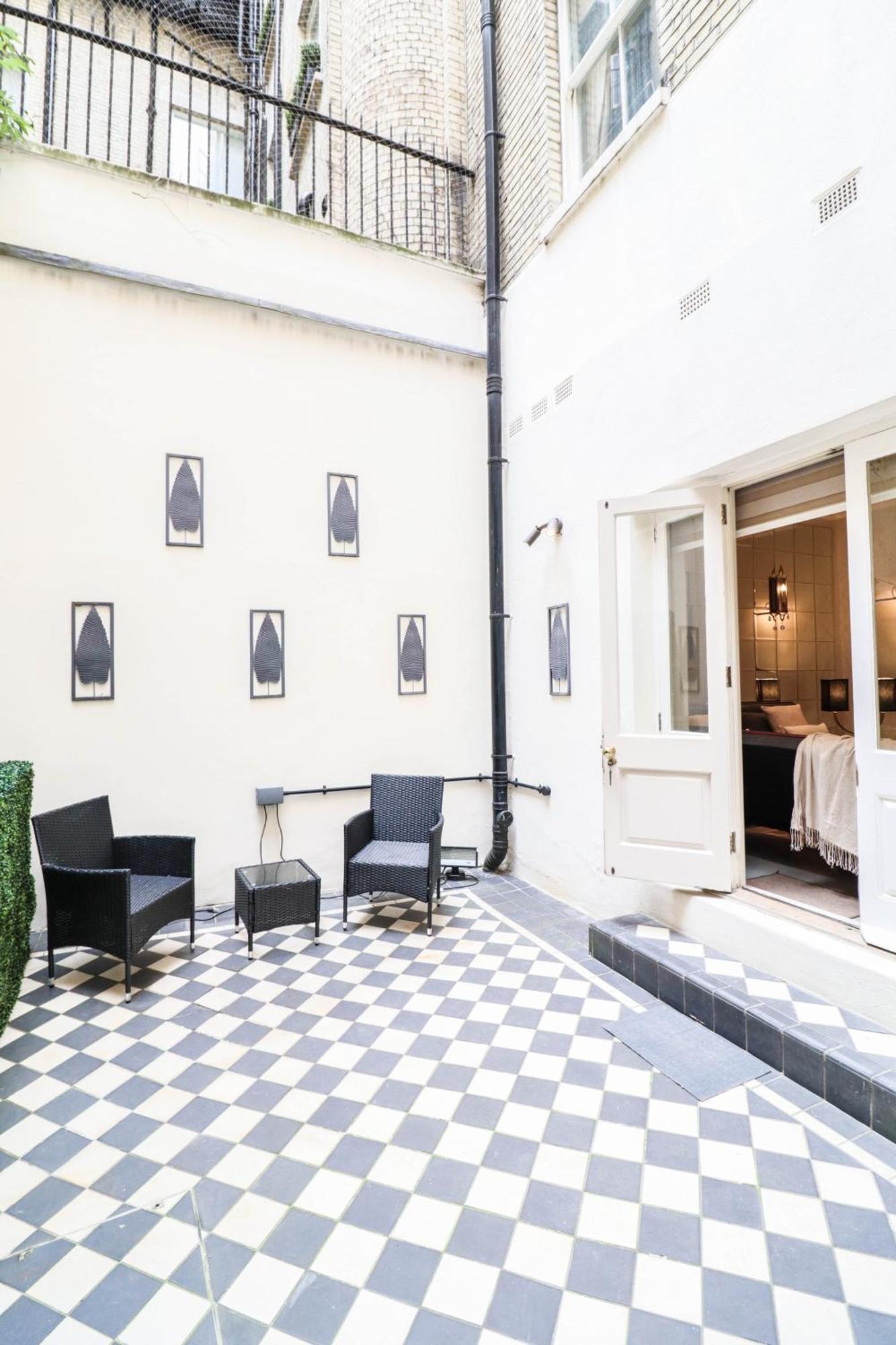 Appartement Elegant One-bedroom! Kensington Flat With Patio